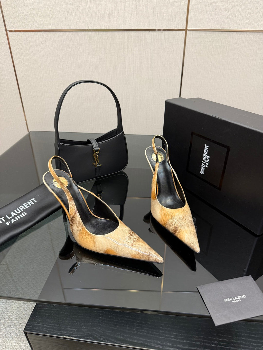 Women’s pointed-toe slingback heels, black with tan speckled uppers and thin stiletto heel