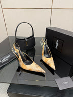 Women’s pointed-toe slingback heels, black with tan speckled uppers and thin stiletto heel