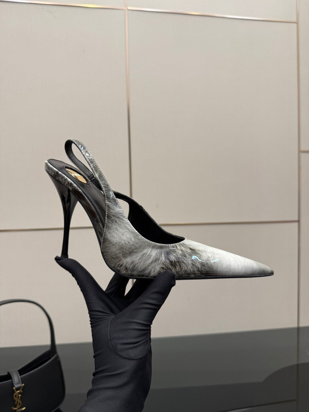 YSL ladies heeled pumps, pointed toes, black and silver metallic, side profile