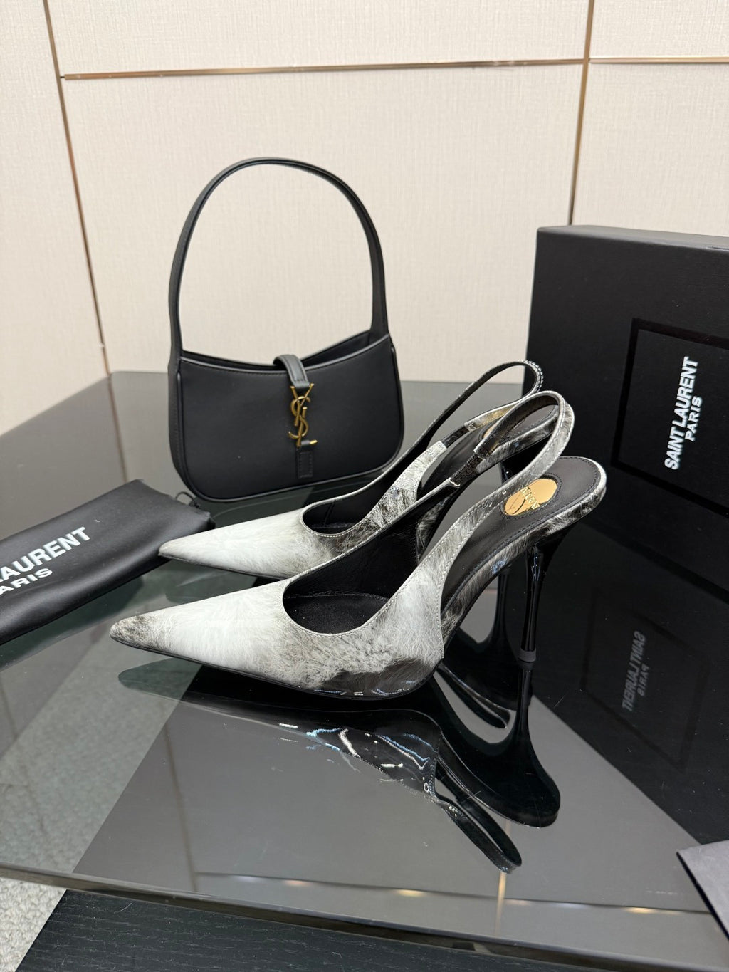 YSL ladies stiletto pumps with pointed toes, black and silver metallic finish