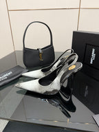 YSL ladies stiletto pumps with pointed toes, black and silver metallic finish