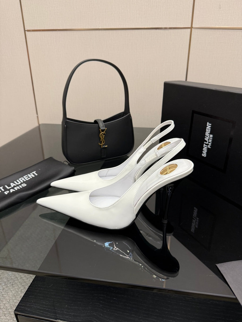 White pointed-toe slingback stiletto heels with slim high heel