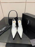 White pointed-toe stiletto heels with slim high heel
