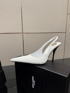White pointed-toe slingback stiletto heel shoe on box, glossy finish