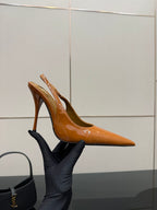 Brown-orange patent pointed-toe high heel with thin strap and tall stiletto heel