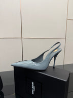 Light blue pointed-toe slingback stiletto heel with slim high heel, glossy.