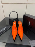 Orange pointed-toe high-heel slingback pumps with stiletto heels and glossy finish
