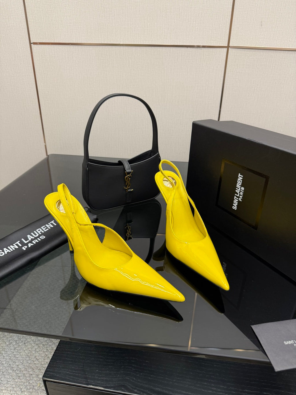 Yellow pointed-toe high-heel slingback shoes with slim stiletto heel, side view