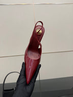 Women’s YSL red patent pointed-toe sling pump, narrow heel, glossy finish