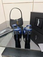 Ladies’ glossy blue pointed-toe high-heel pumps, front view