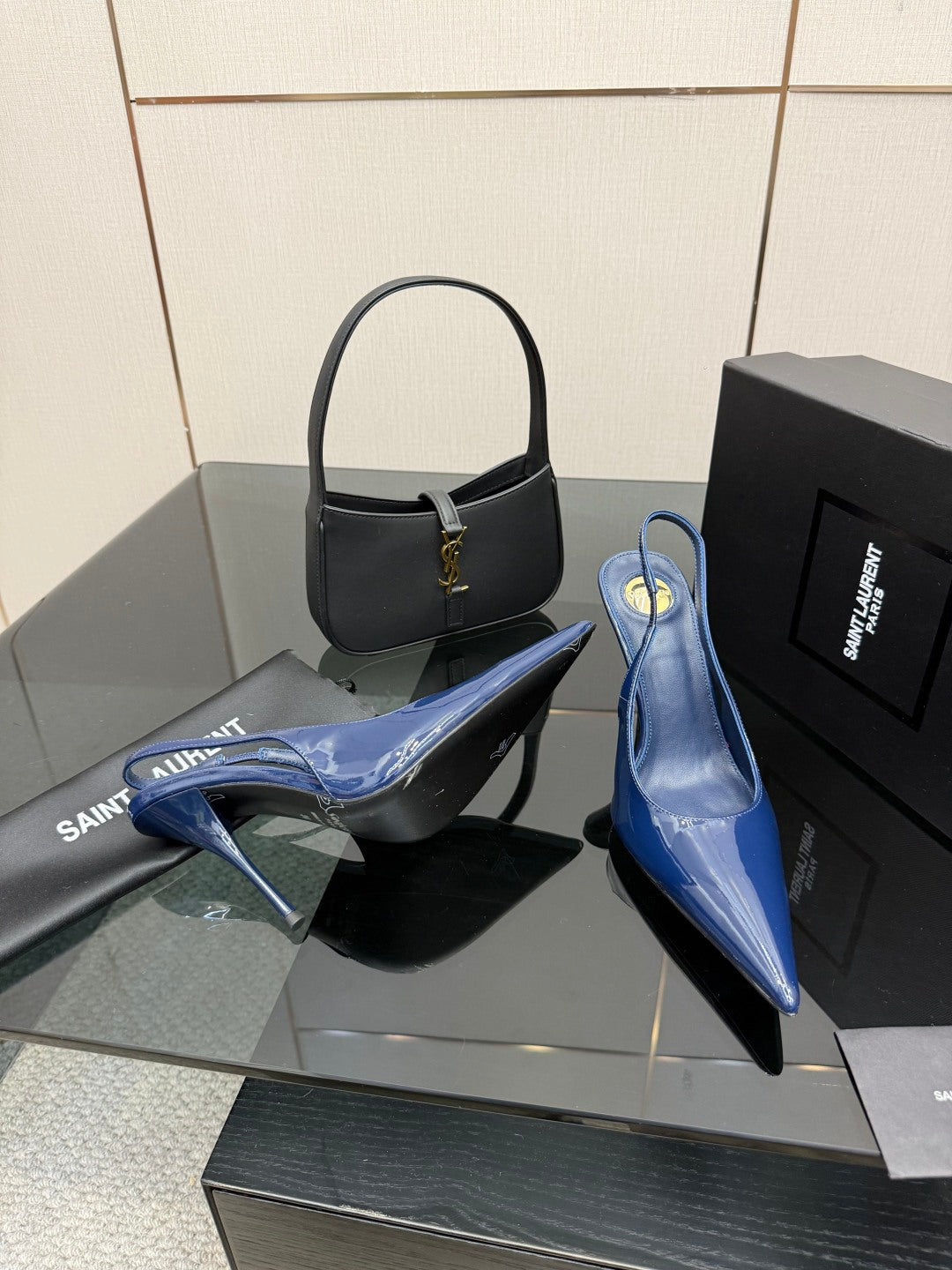 Ladies’ glossy blue pointed-toe high-heel pumps, front and back angles