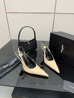 YSL slingback pumps: cream pointed-toe with slim gold heel, paired with black handbag