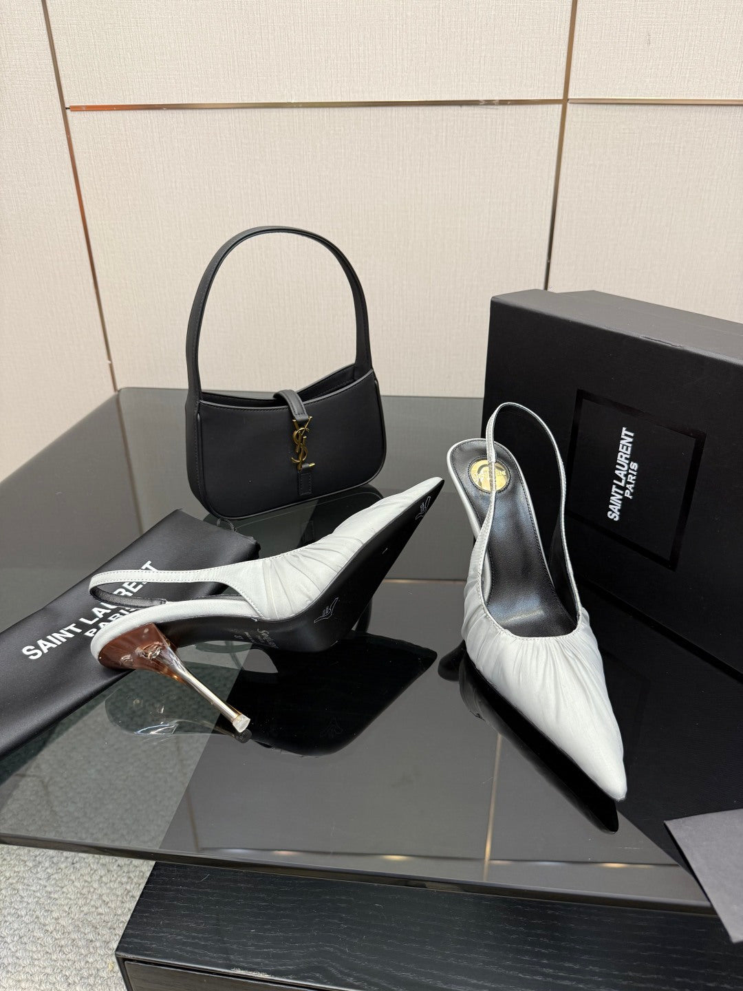 YSL ladies white leather slingback heel shoe with pointed toe and black stiletto