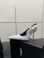 YSL ladies white pointed-toe slingback heel with thin gold stiletto and black sole