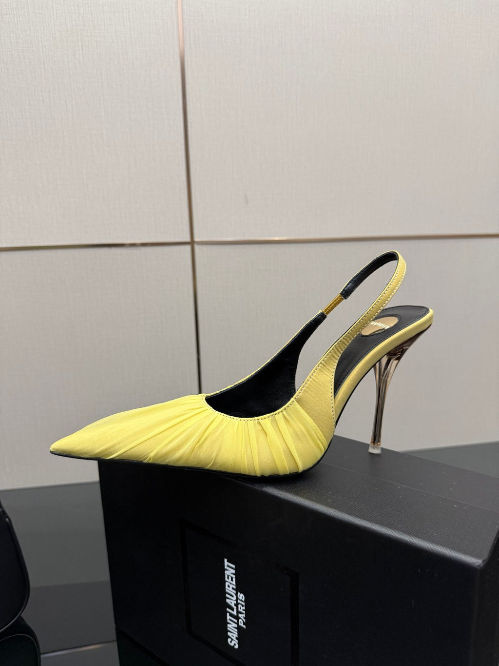 Single yellow pointed-toe slingback stiletto heel shoe, metallic silver heel