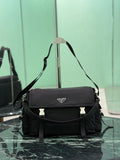 Black Prada messenger bag with front flap, logo plate, and crossbody strap.