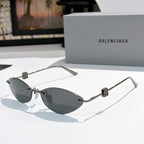Balenciaga sunglasses with dark lenses and gunmetal metal frames