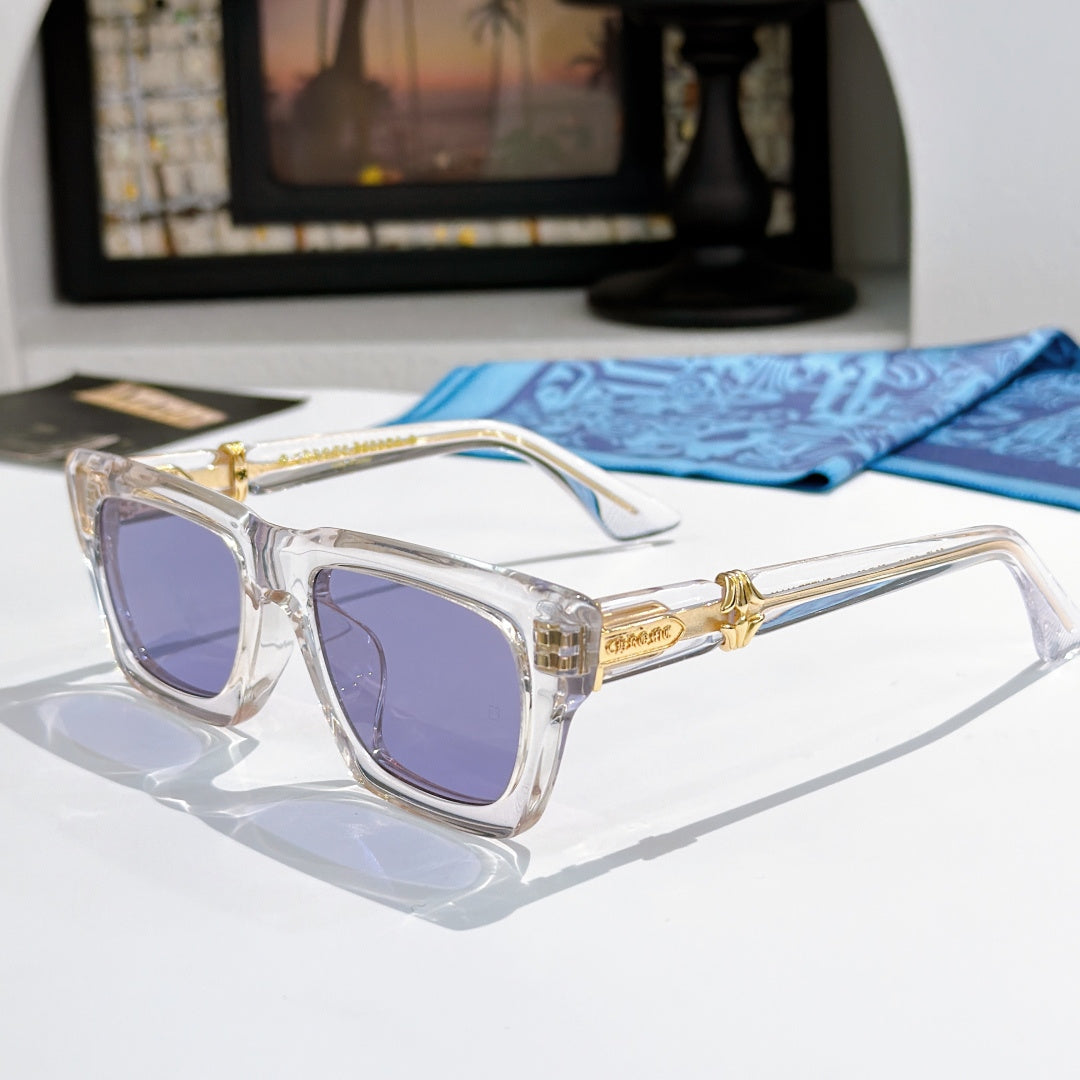 Clear square sunglasses with purple-tinted lenses and gold-tone logo on arms