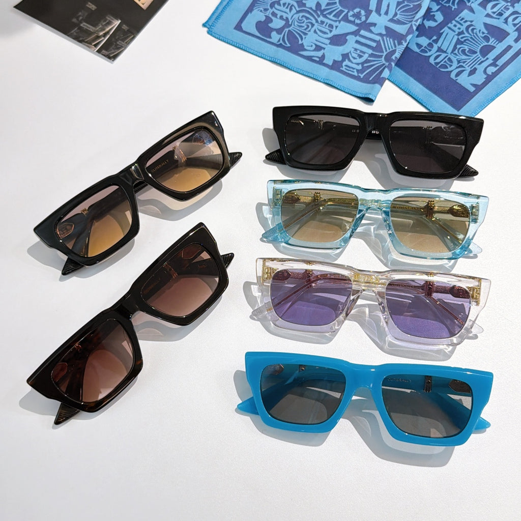 Multi-color sunglasses set with square frames, tinted lenses, and gold-tone accents
