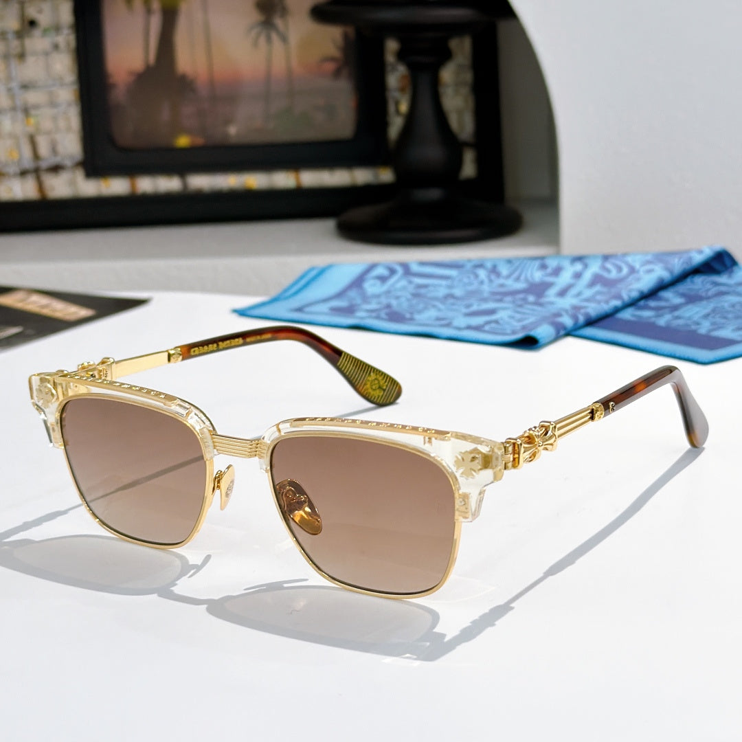 Chrome-framed glasses with clear gold frame and brown-tinted lenses