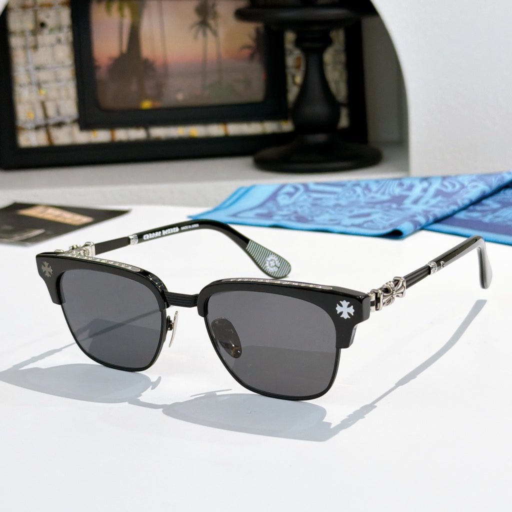 Chrome-framed glasses with black frames and dark lenses