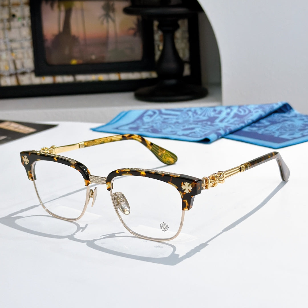 Metal eyeglasses with clear lenses, tortoise-style frame, and gold-toned temples