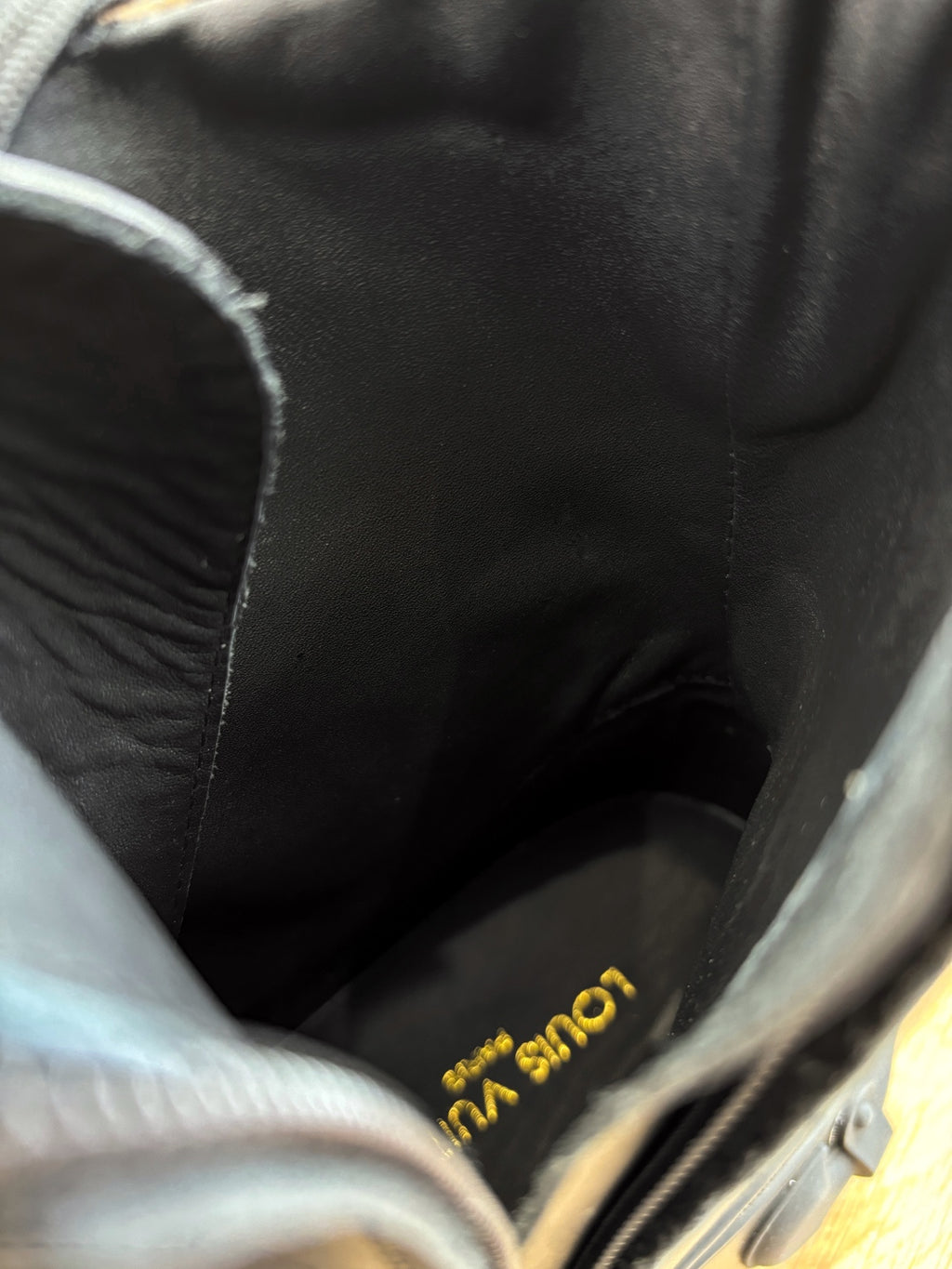 Louis Vuitton unisex boot lining, dark leather with gold logo text