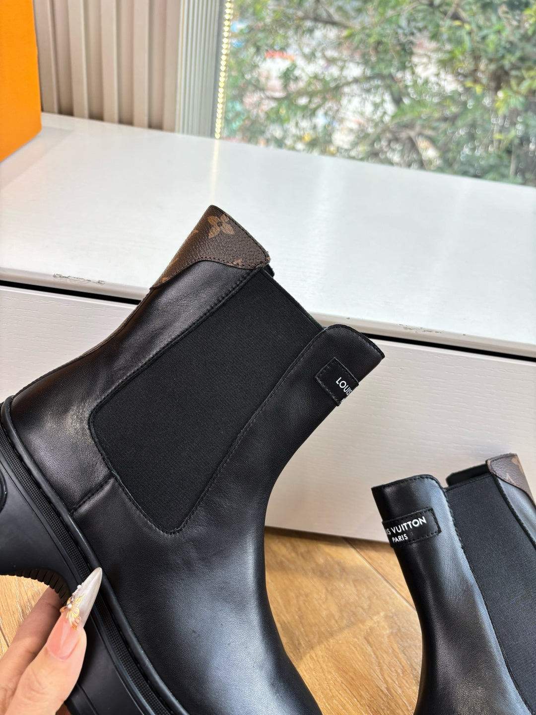 Louis Vuitton unisex black leather chelsea boot with elastic side panel and pull tab