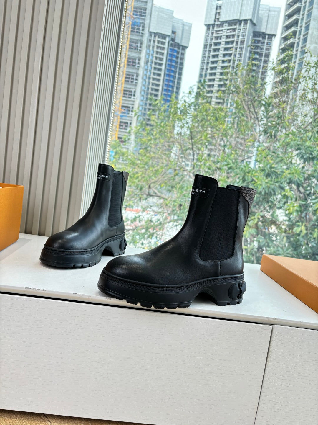 Louis Vuitton unisex black chelsea boots with side elastic panels and chunky tread sole
