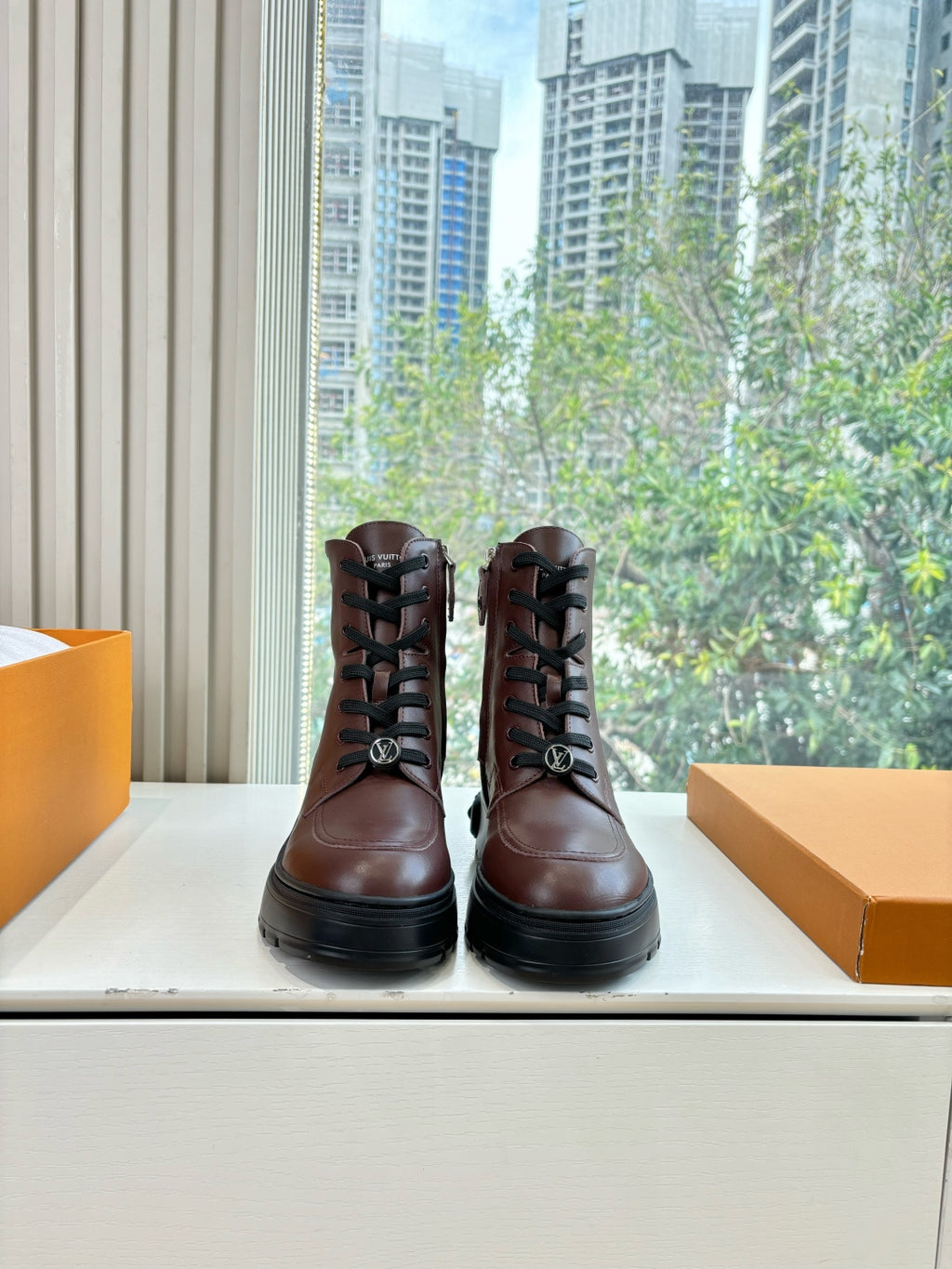 Louis Vuitton brown leather lace-up boots with black tread sole
