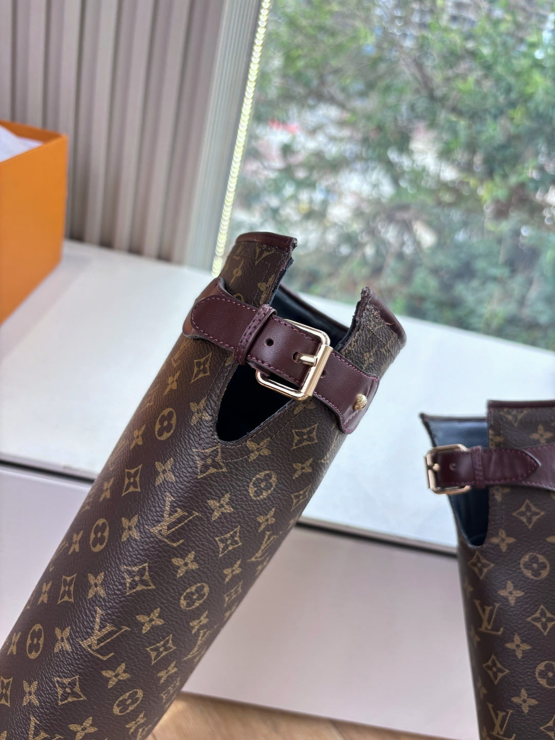 Louis Vuitton unisex monogram tall boots with double buckle strap detail, dark brown