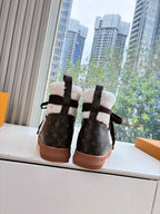 High-top sneakers with Louis Vuitton monogram canvas, dark laces, and shearling lining