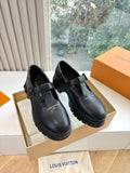 Louis Vuitton leather loafers with buckle straps, black, pair on box
