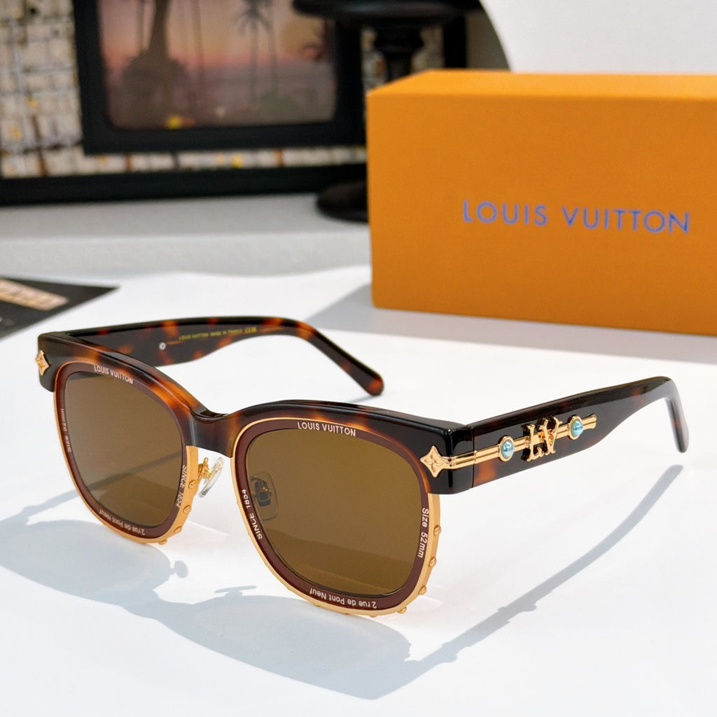 Louis Vuitton sunglasses with tortoiseshell frames and brown lenses, gold logo on temple