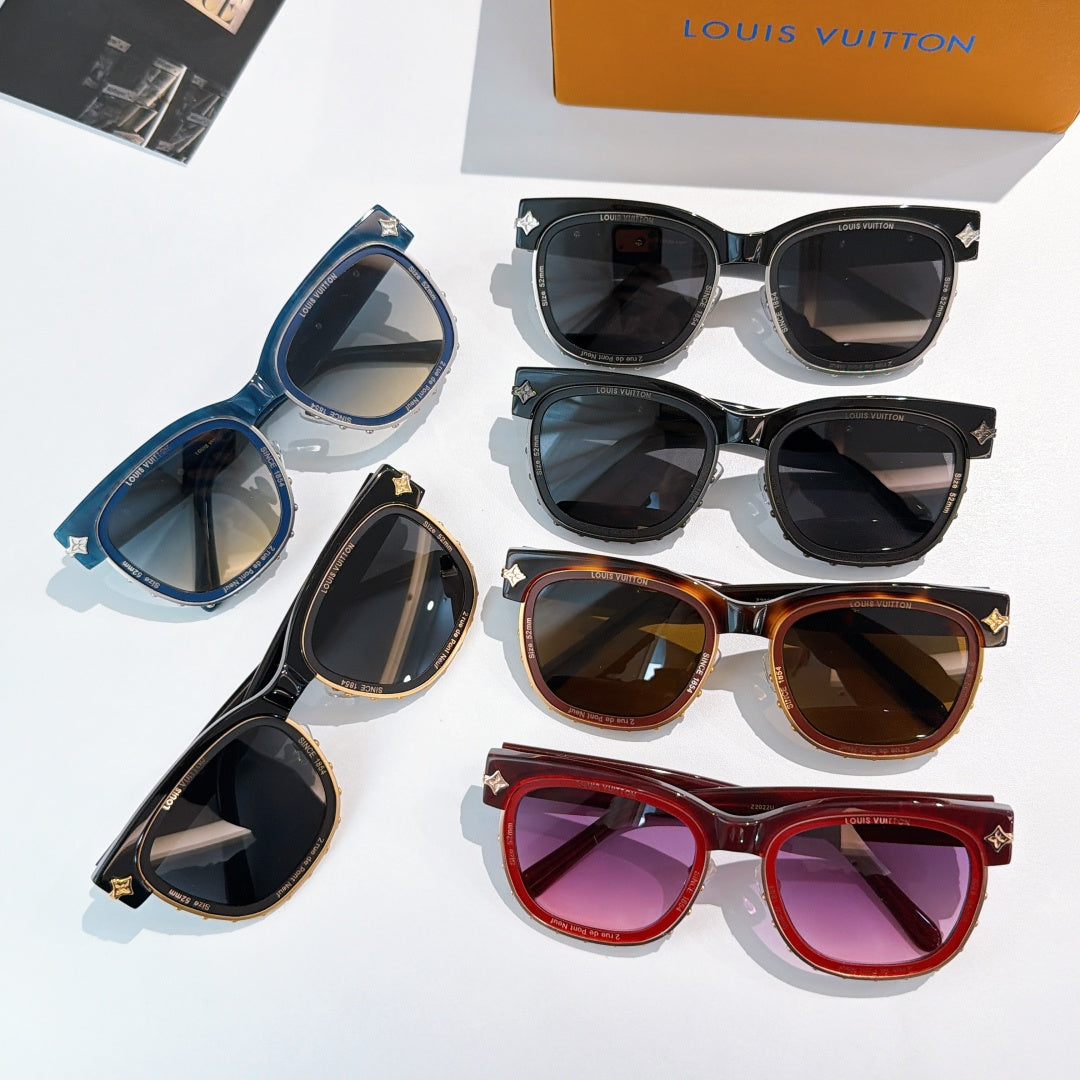 Group of Louis Vuitton sunglasses with various blue, black, and brown tinted lenses