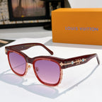 Louis Vuitton sunglasses with red frames and purple lenses, gold logo detail on temple