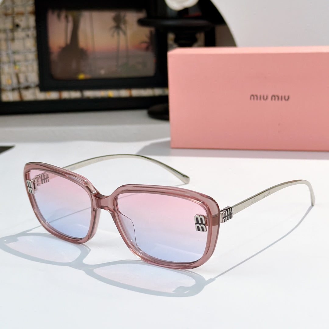 MiuMiu pink sunglasses with rounded frames and gold logo detail on temples