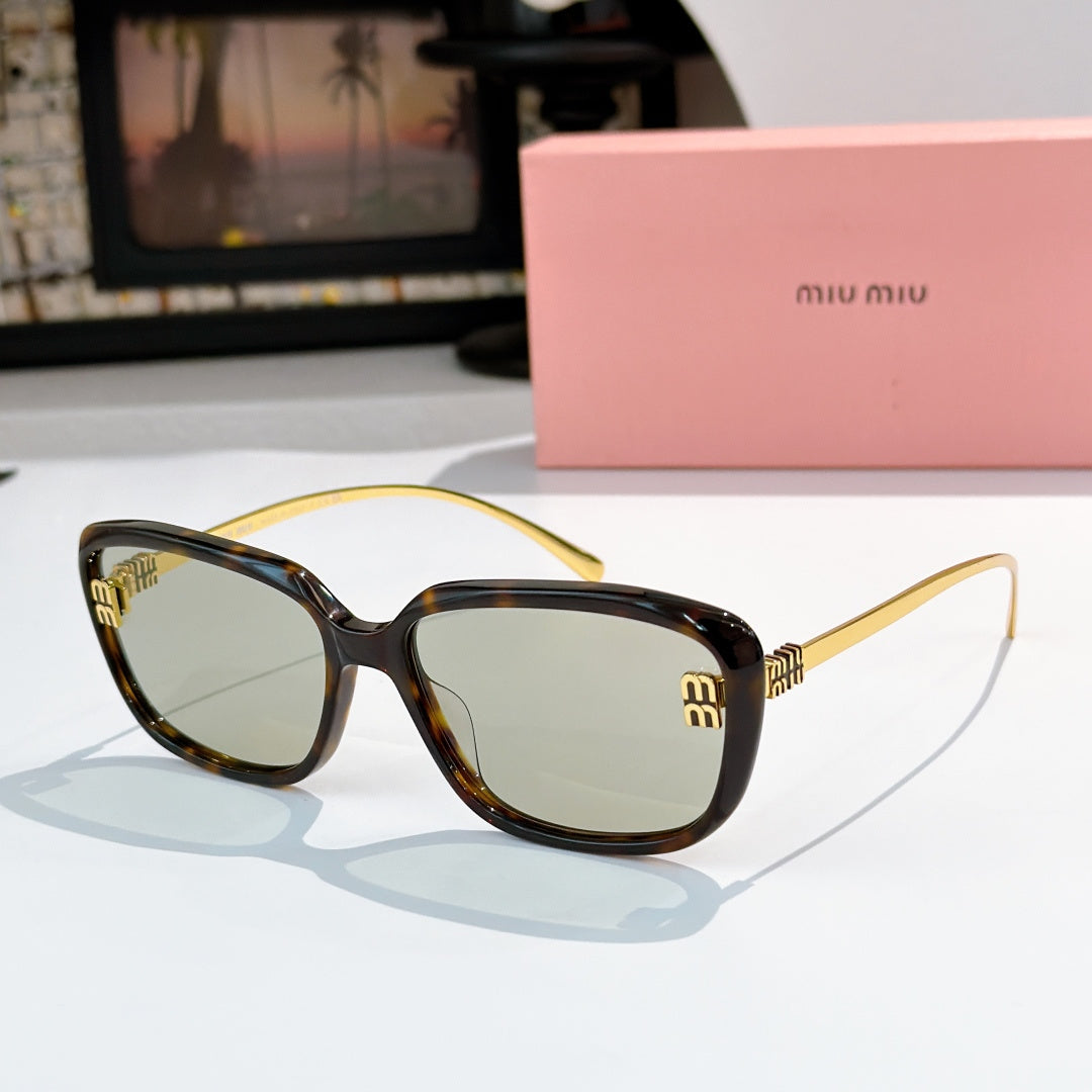MiuMiu dark tortoiseshell sunglasses with squared rounded frames and gold logo temples