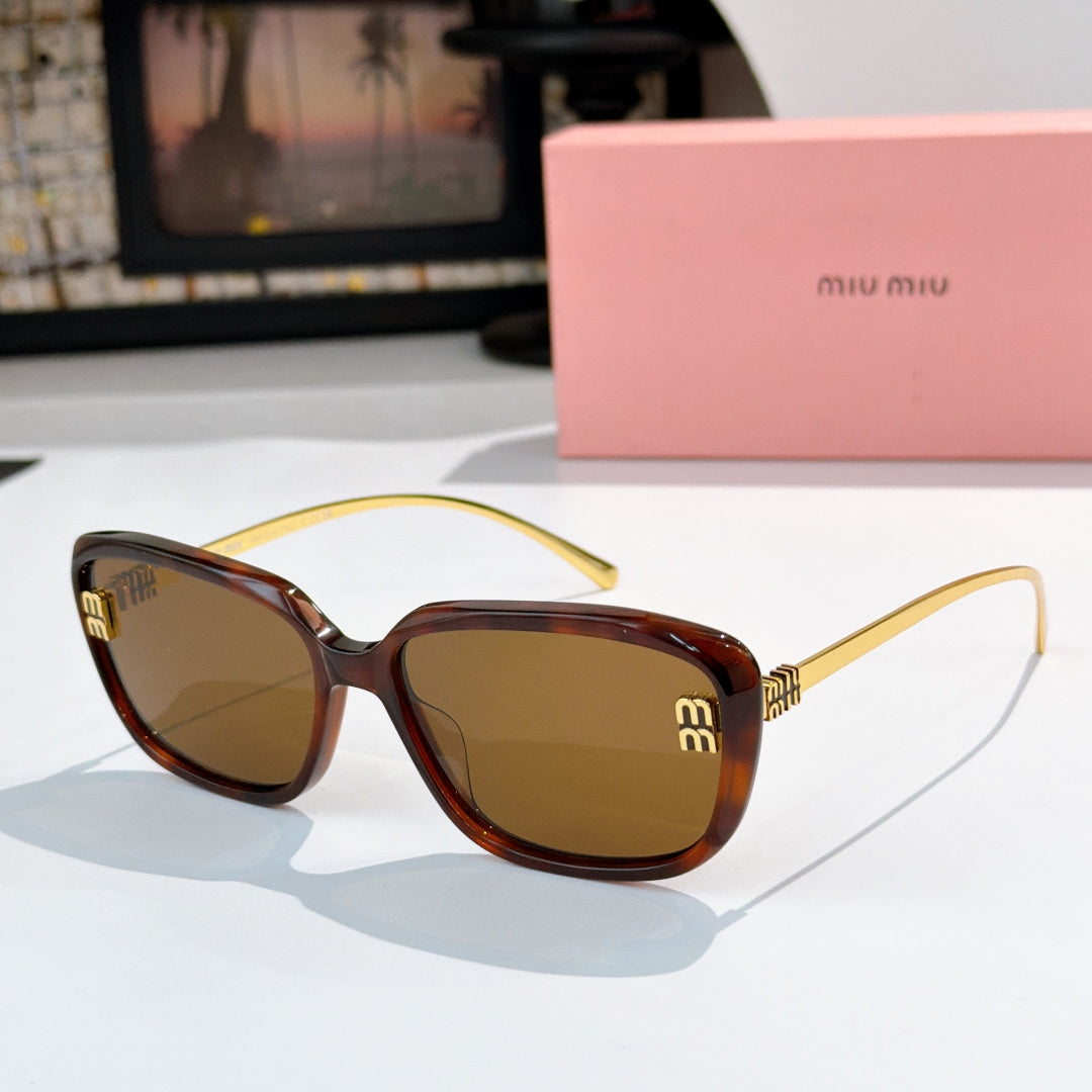 MiuMiu tortoiseshell sunglasses with rounded frames, yellow temples, and gold logo