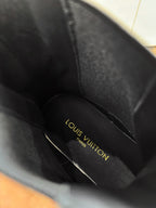 Louis Vuitton boot insole with embossed 'LOUIS VUITTON' lettering