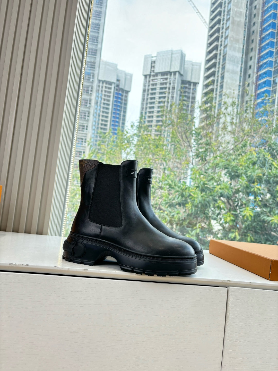 Louis Vuitton unisex black leather chelsea boots, elastic gussets and rubber tread sole