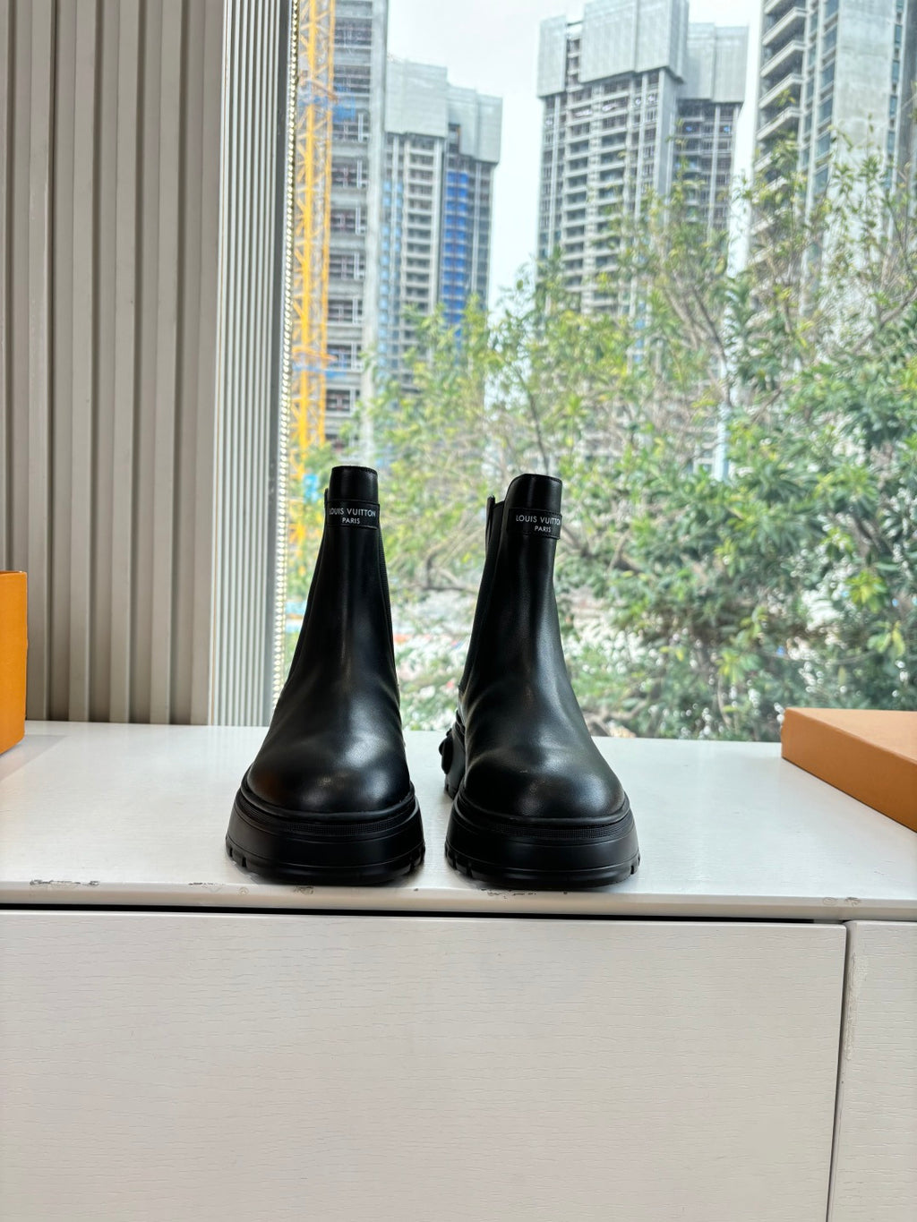 Louis Vuitton unisex black leather chelsea boots, round toe, low tread sole