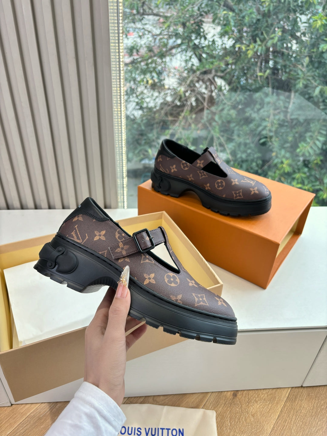 Monogram slip-on loafer shoes, dark brown patterned upper with black buckle detail