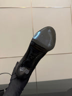 YSL ladies black boot sole with small logo detailing and tread pattern