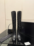 YSL ladies knee-high black leather boots with gold buckle strap