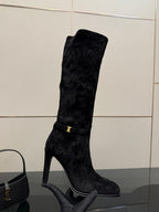 YSL ladies black tall heeled boot, close angled view of front upper and buckle