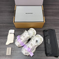 Balenciaga sandals in white with lilac ribbon bows, chunky sole, lace-up straps