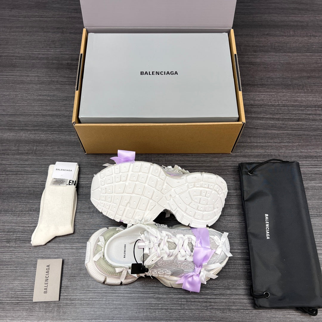 Balenciaga sandals with white sole and lilac ribbon bow, underside view