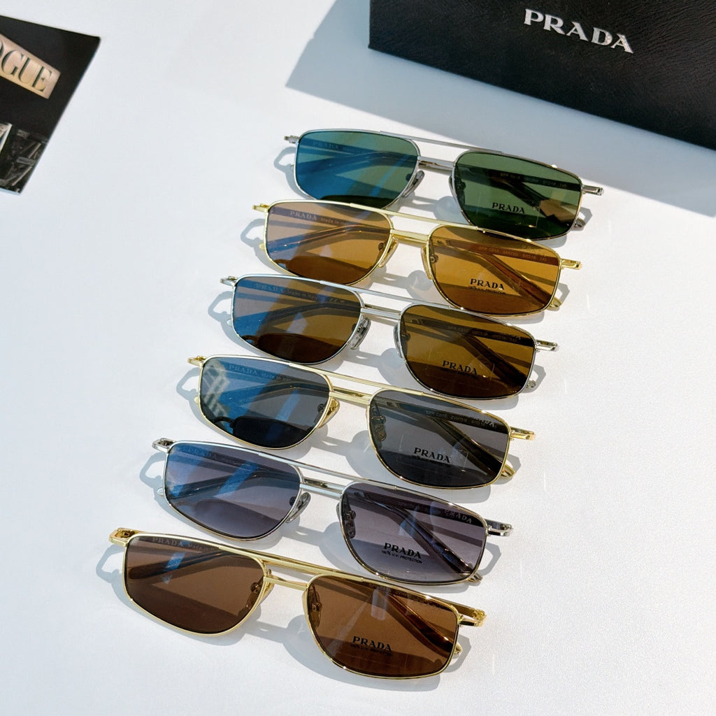 Prada sunglasses assortment with blue and brown lenses on metal frames