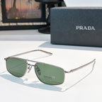 Prada sunglasses with green lenses and silver frame